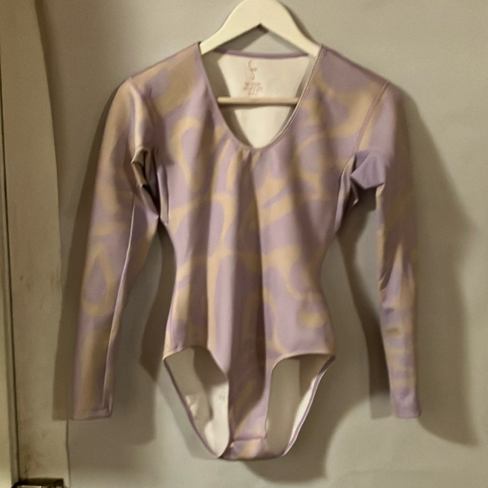 Surfwear one-piece long sleeve suit.. light lavender/cream..